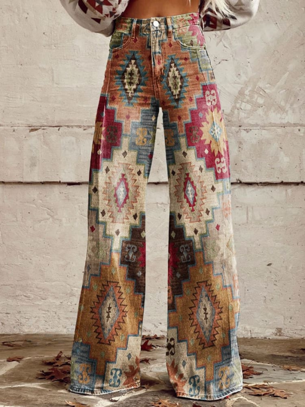 Pantalón palazzo boho Dakota de Vega Madrid, en tela ligera con estampado floral y cintura elástica, para un estilo cómodo y elegante.